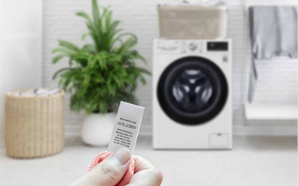 washer cycles picture checking the care label